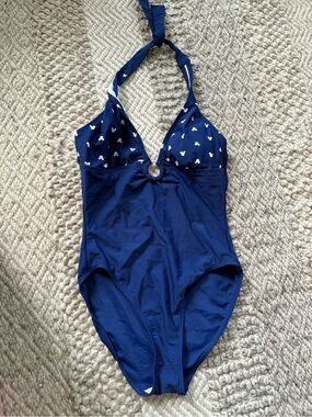 Disney size 10
Navy One-Piece Swimsuit with Mickey Print ring center halter